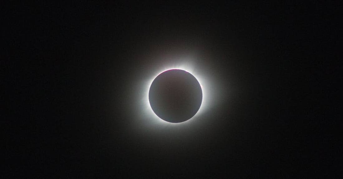 Stunning photograph of a total solar eclipse revealing the sun's corona.